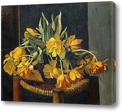    Желтые тюльпаны на соломенном стуле